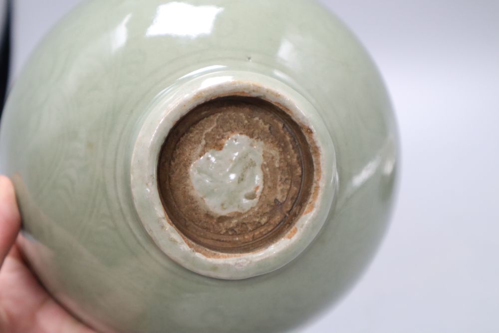 A Chinese celadon bowl, a Thai market famille rose bowl and a crackle glaze bowl